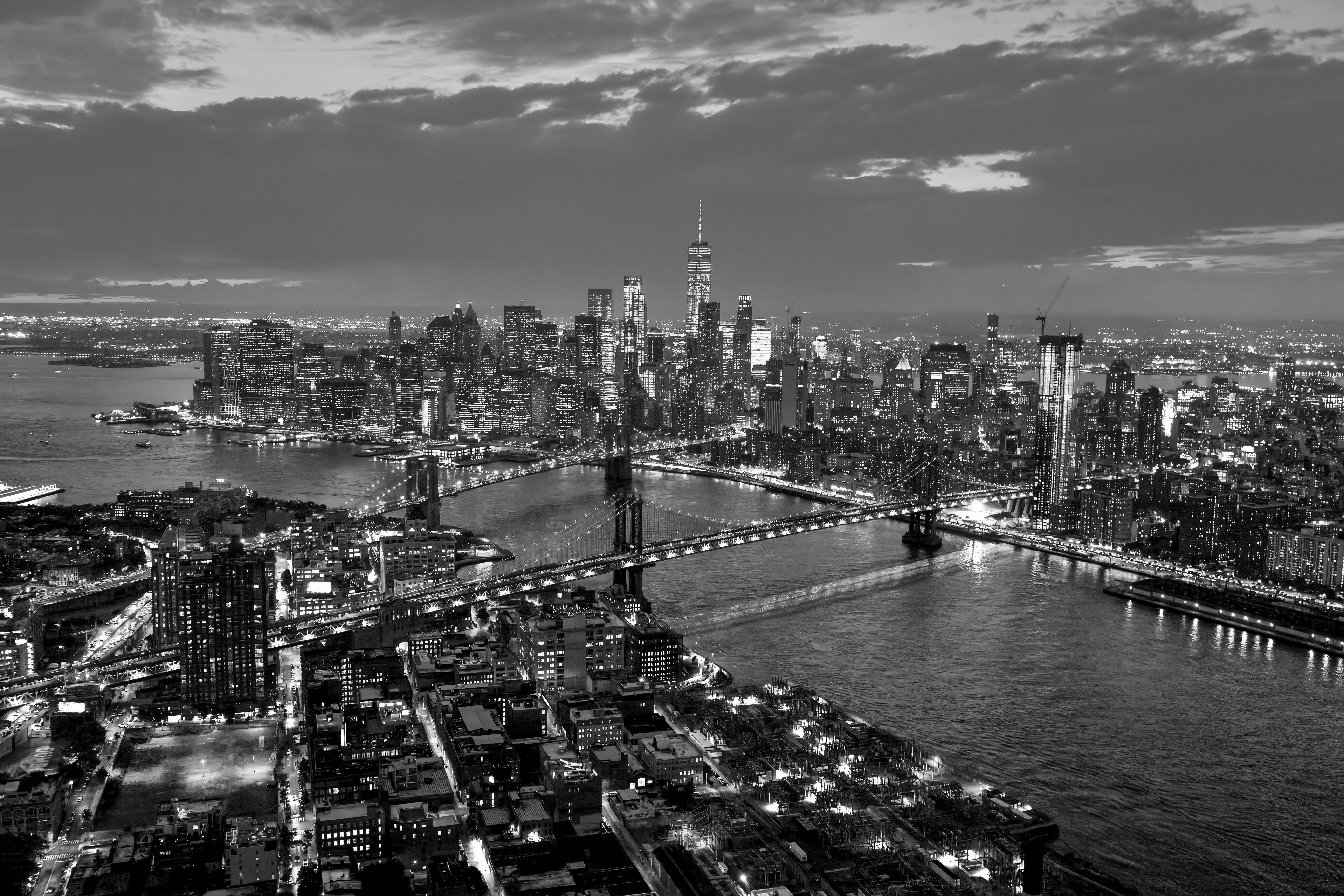 Manhattan and Brooklyn Bridges at Night - Black and White Aerial NYC