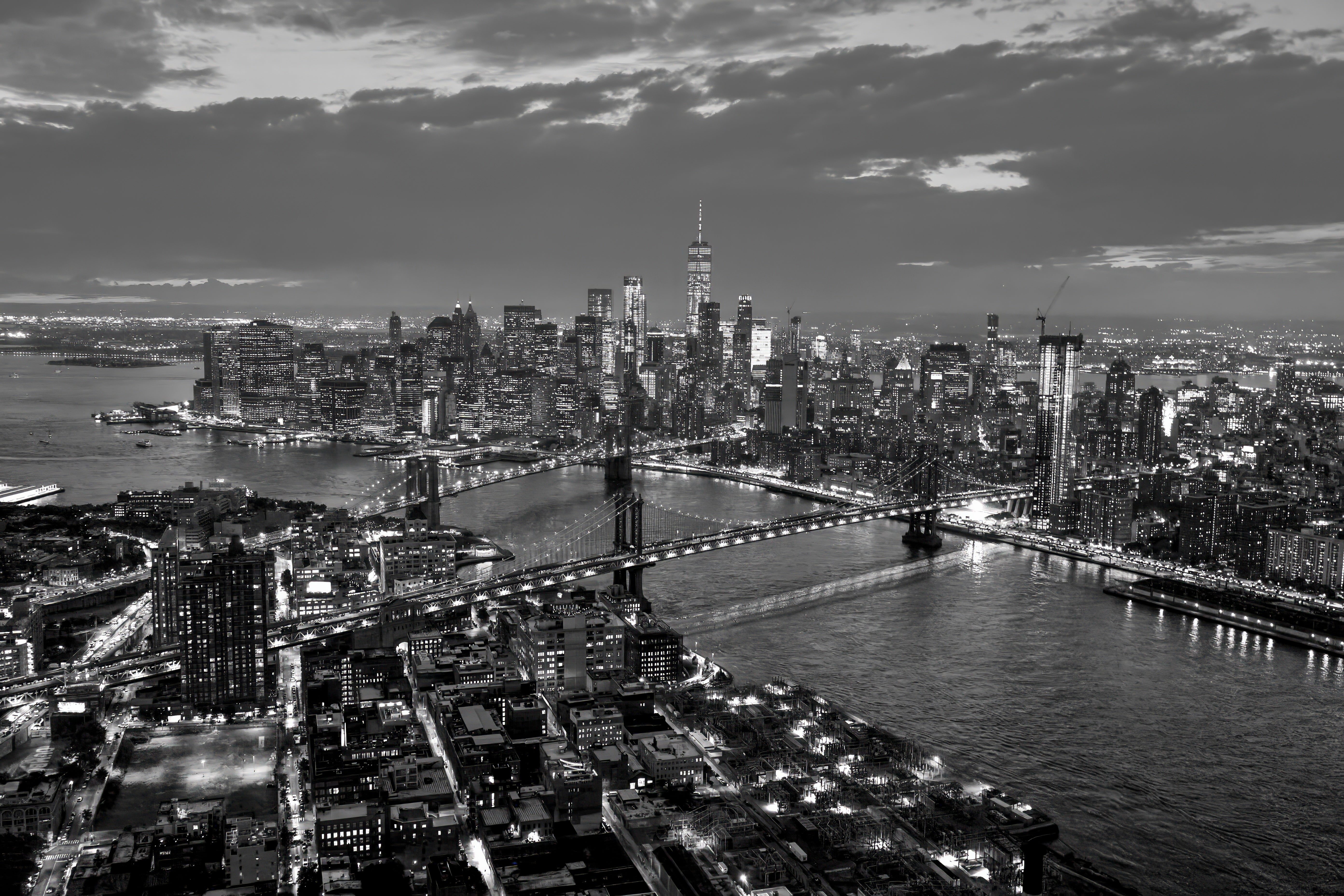 Manhattan and Brooklyn Bridges at Night - Black and White Aerial NYC