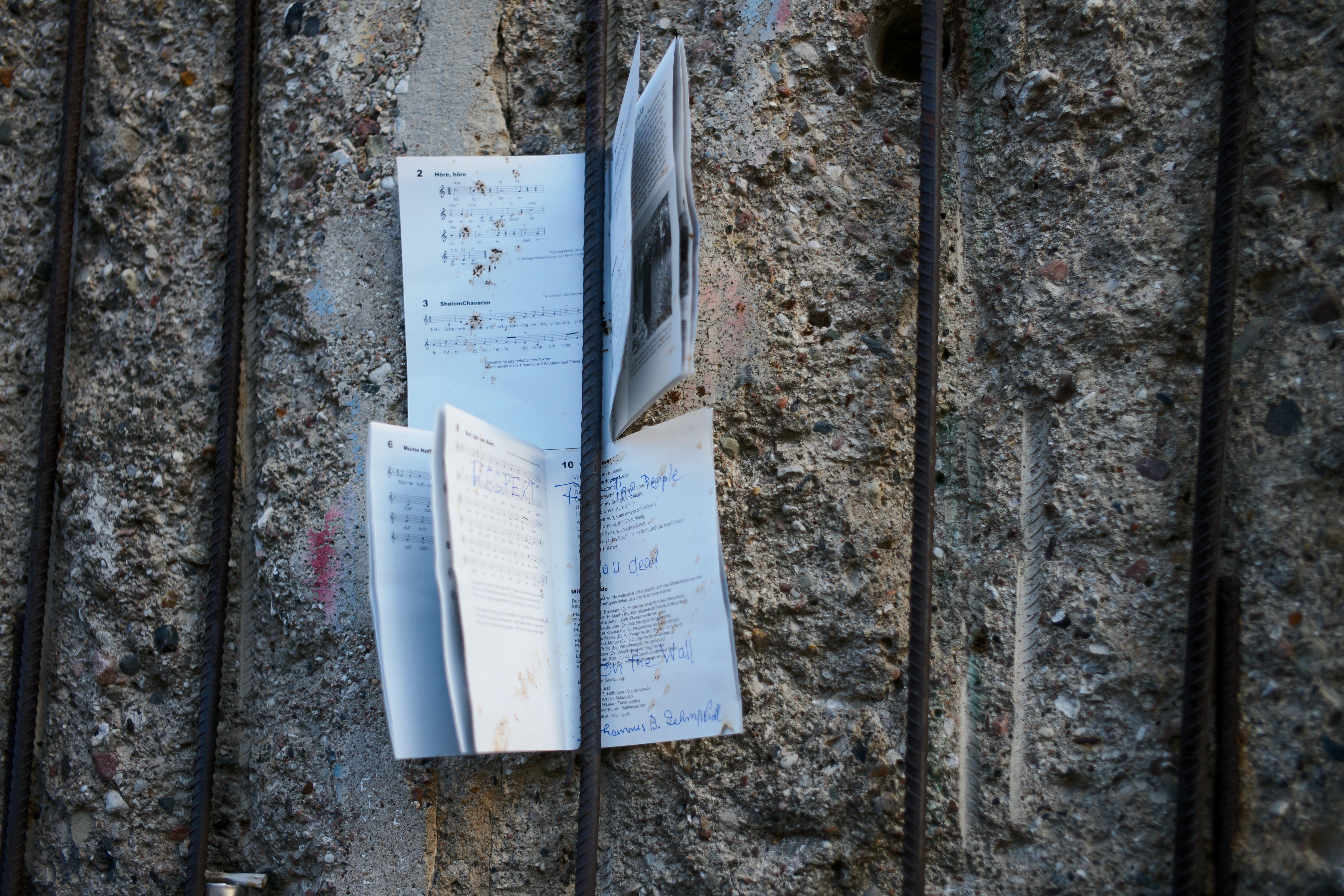 Weathered Sheet Music on a Concrete Wall - Abstract Detail Photography