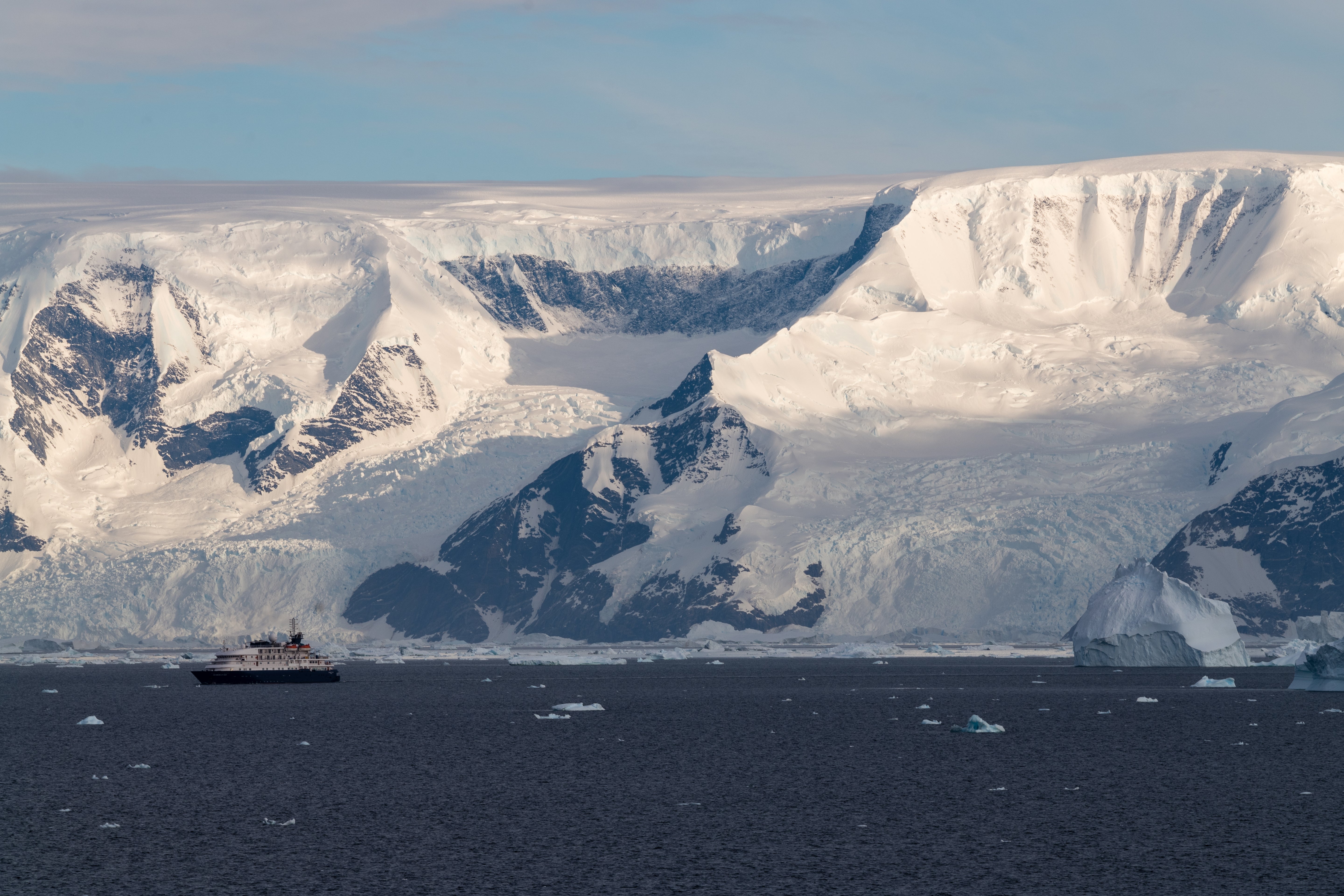 Expedition Ship Below Antarctic Glaciers - Polar Voyage Photography