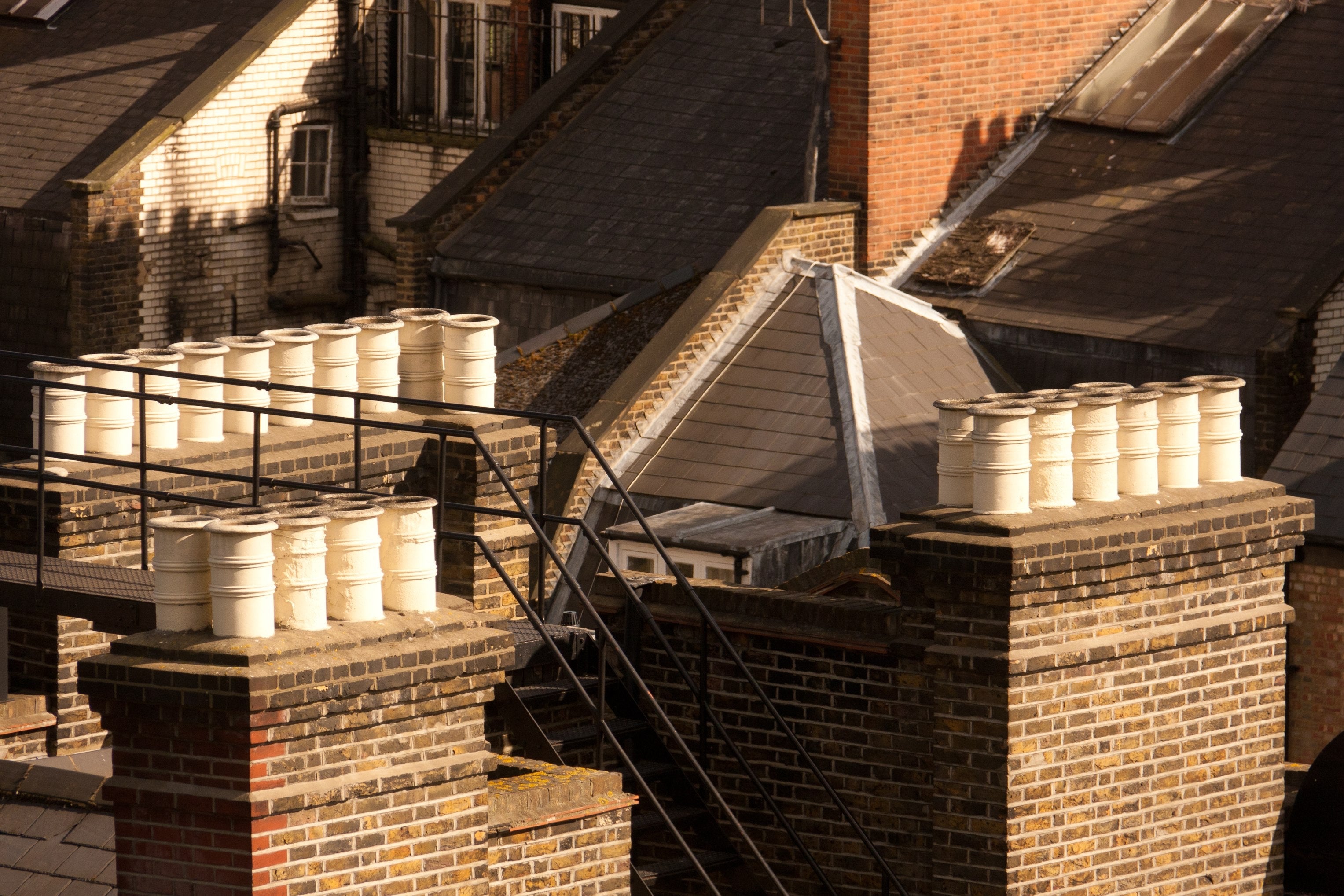 Chimney Pots at Golden Hour - London Rooftops Photography