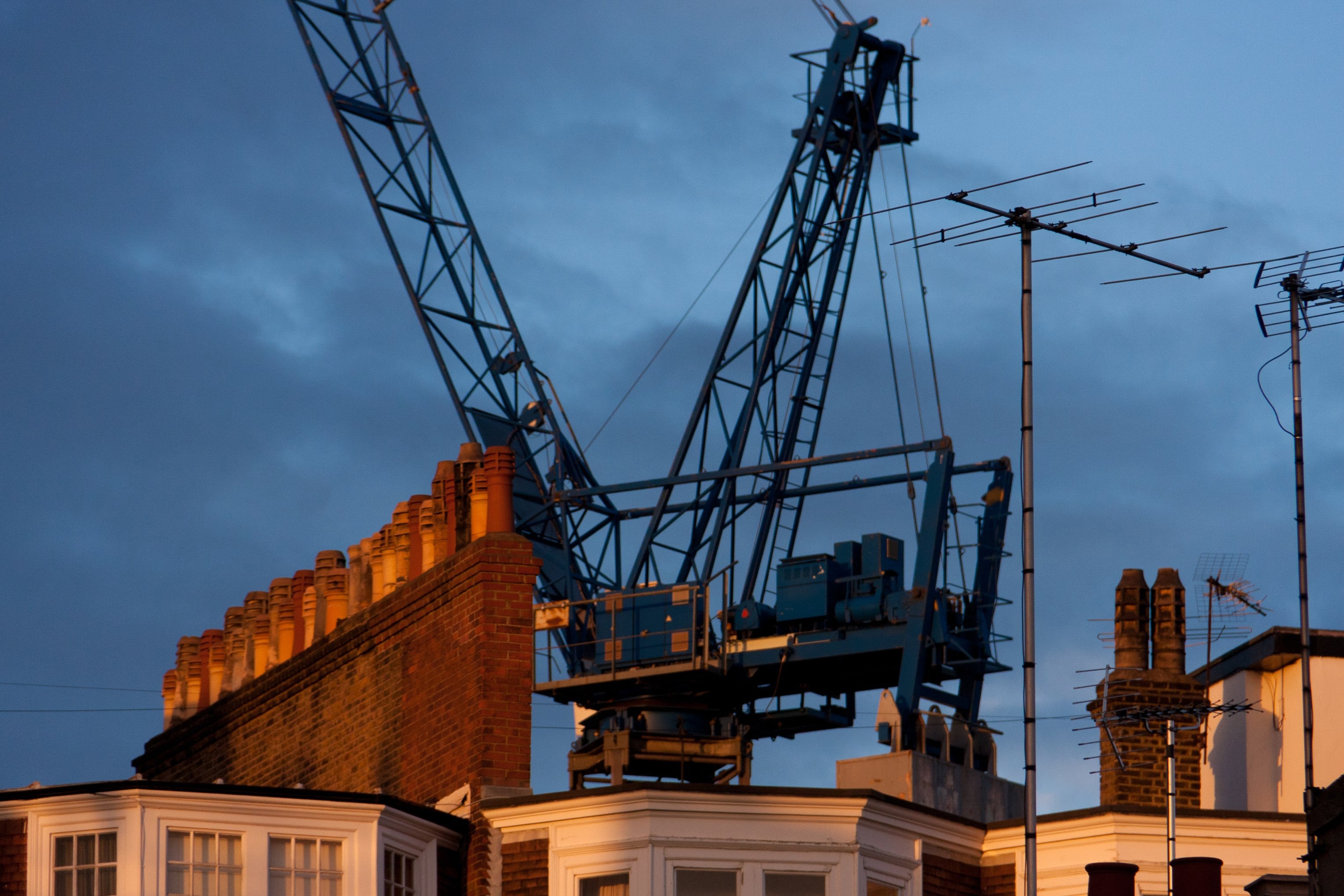 Rooftop Crane and Chimney Pots - London Dusk Photography